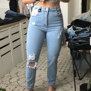 High Rise Distressed Stretch Jeans